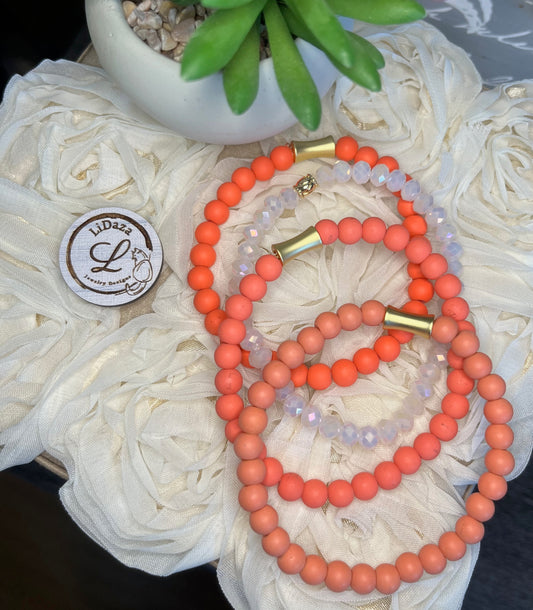 Orange colored glass and crystal bracelet set